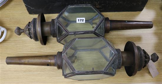 A pair of brass carriage lanterns, height 58cm